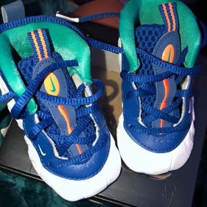 Blue and white Nike posite pro